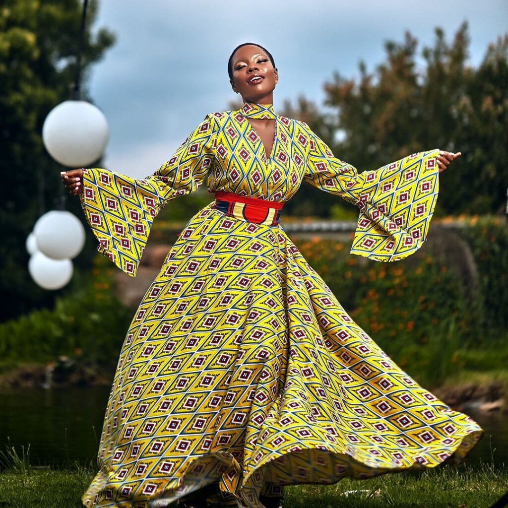 Nambitha Ben-Mazwi Poses in a gown